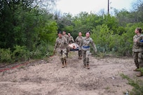 433rd Medical Group Reserve Airmen participate in a mass-casualty response training event Sep. 6, 2025, at Camp Bramble, located on Joint Base San Antonio-Lackland, Texas.