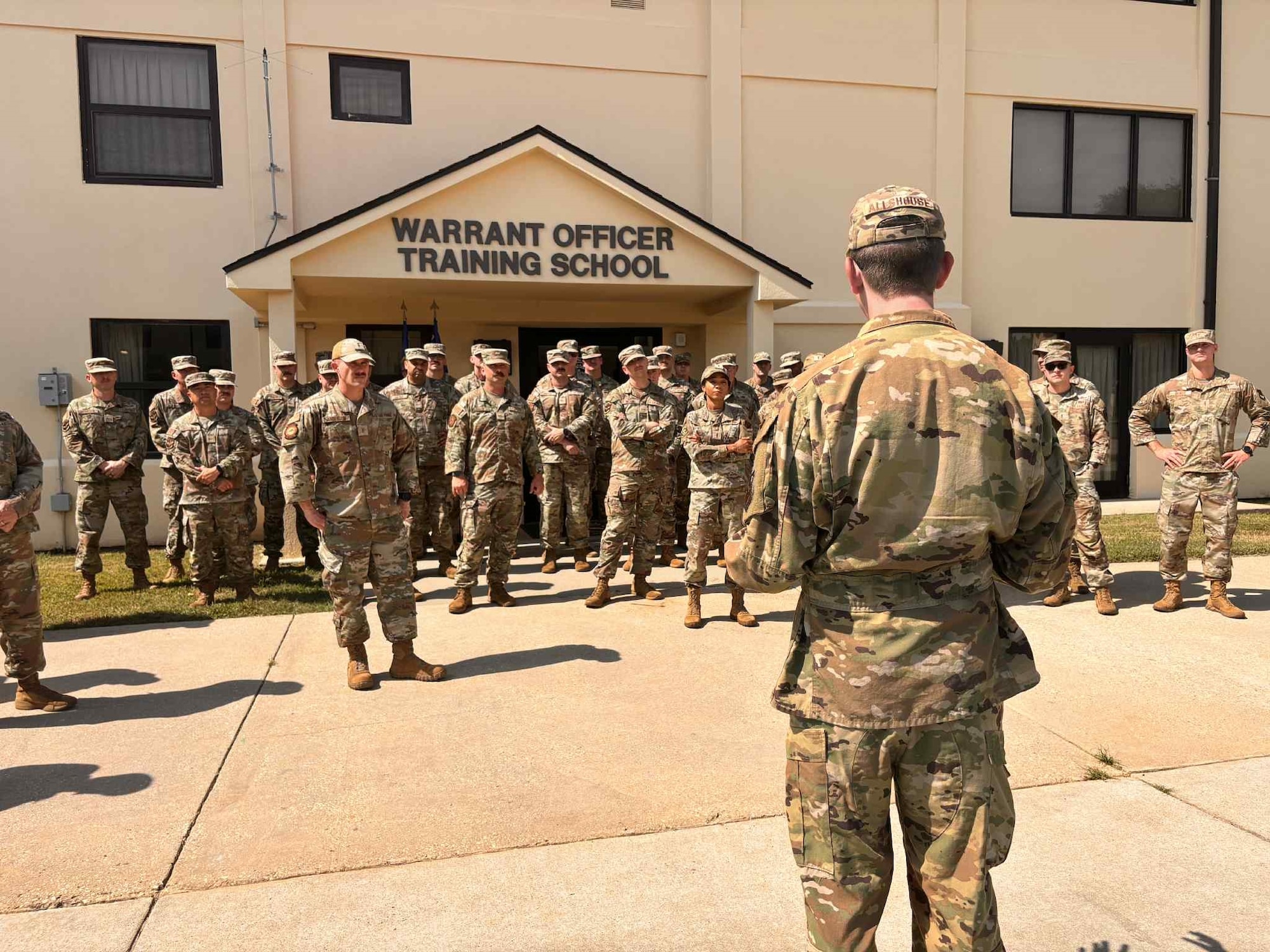 Major Tanner Allhouse, commandant of the Warrant Officer Training School addresses trainees and visiting warrant officers during the school’s first Warrant Officer Summit since its reestablishment at Maxwell Air Force Base, Ala. August 28, 2025. (U.S. Air Force photo by Captain Rachael Parks)