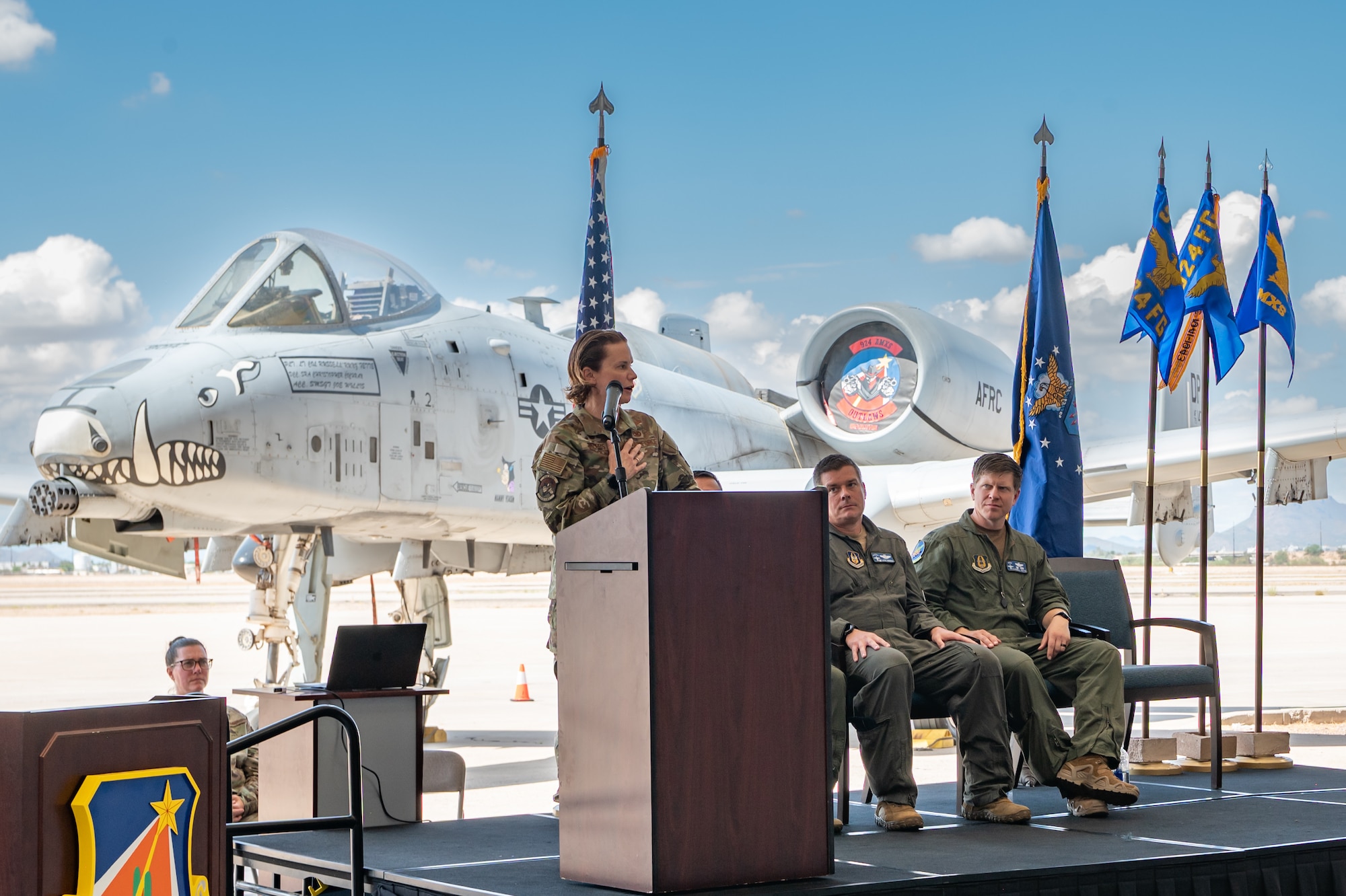 Lt. Col. Meredith “Xena” Morris, 924th Aircraft Maintenance Squadron and Maintenance Squadron commander, speaks during the 924th Fighter Group inactivation ceremony Sept. 6, 2025, at Davis-Monthan Air Force Base, Ariz. Morris praised the maintainers and Airmen who sustained the unit through its final deployments and competitions. (U.S. Air Force photo by Tech. Sgt. Tyler J. Bolken)