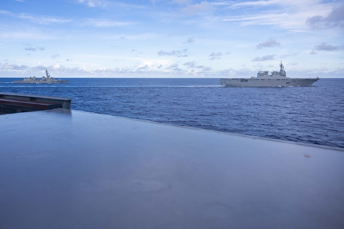 Japanese Maritime Self-Defense Force ships JS Ise (DDH 182) and JS Suzunami (DD 114) sail alongside the Arleigh Burke-class guided-missile destroyer USS Higgins (DDG 76) while conducting bilateral operations in the Philippine Sea, Sept. 5.