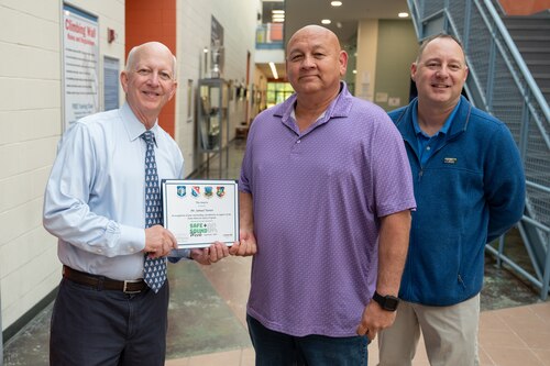 image of people giving an award