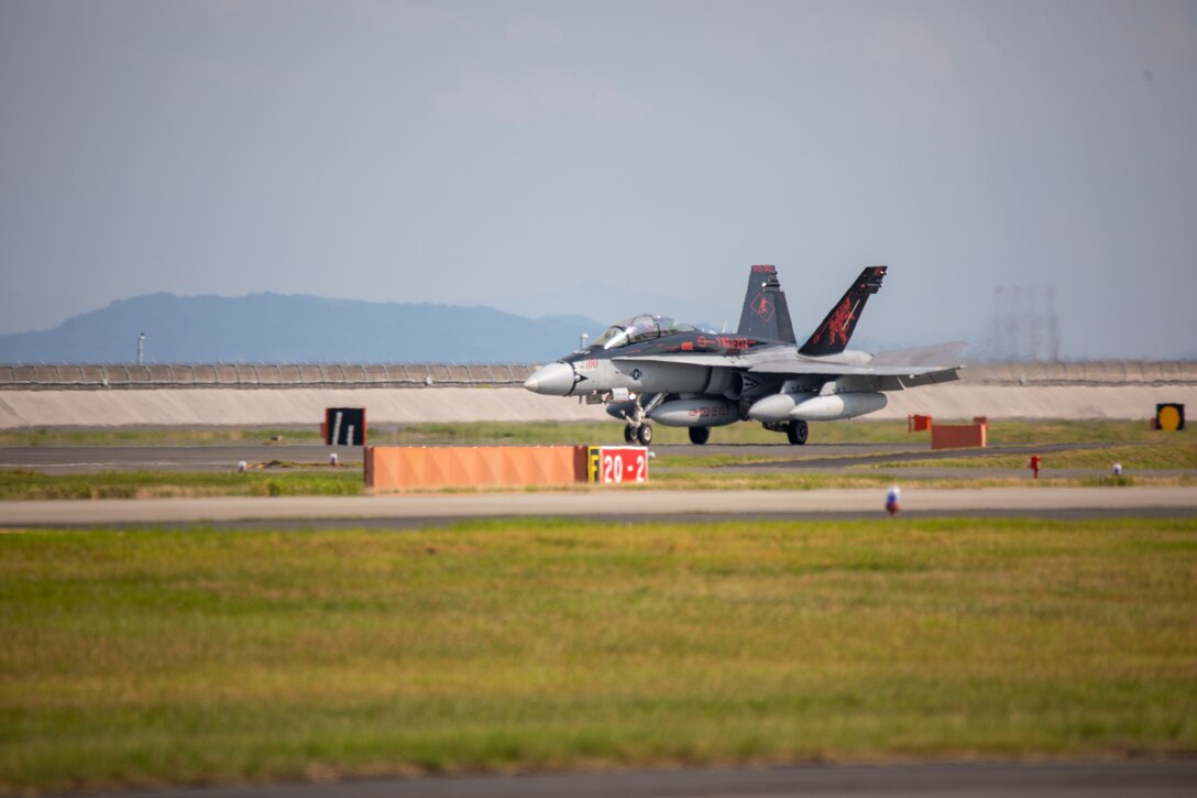 A U.S. Marine Corps F/A-18D Hornet aircraft with Marine Fighter Attack Squadron (VMFA) 232, Marine Aircraft Group 12, 1st Marine Aircraft Wing, lands on the flight line at Marine Corps Air Station Iwakuni, Japan, Sept. 8, 2025.