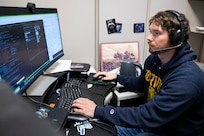Kenneth Stewart, Ph.D., U.S. Naval Research Laboratory (NRL) computer research scientist, performs a reinforcement learning control test on free-flyer robots aboard the International Space Station from NRL headquarters in Washington, D.C., May 27, 2025. The test demonstrated the potential of reinforcement learning to improve robotic autonomy for space exploration and logistics. (U.S. Navy photo by Sarah Peterson)