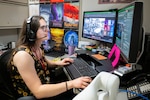 Samantha Chapin, Ph.D., U.S. Naval Research Laboratory (NRL) space roboticist, performs a reinforcement learning control test on free-flyer robots aboard the International Space Station from NRL headquarters in Washington, D.C., May 27, 2025. The test demonstrated the potential of reinforcement learning to improve robotic autonomy for space exploration and logistics. (U.S. Navy photo by Sarah Peterson)