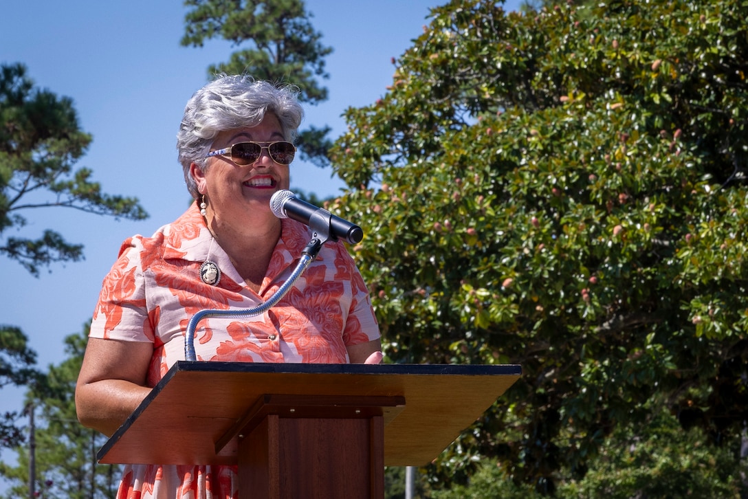 Hope Fiorvanti, II Marine Expeditionary Force Chief of Protocol, addresses the audience during her retirement ceremony at Marine Corps Base Camp Lejeune, North Carolina, Sept. 5, 2025. For more than a decade, Fiorvanti served as a special staff officer for II MEF and was the subject matter expert on the planning, coordination and synchronization required to support all special events and Distinguished Visitors to the command. (U.S. Marine Corps Photo by Cpl. Adam Scalin)