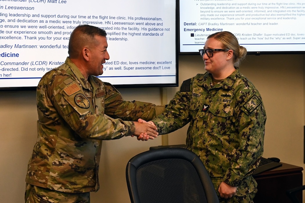 Chief Master Sergeant George R. Silvas of the 161st Medical Group, Arizona Air National Guard, recognized Hospital Corpsman Second Class Madyson Schmidt, assigned to Naval Medical Readiness Training Command (NMRTC) Sigonella, July 14–24. Schmidt served as the command liaison during the ANG’s annual Medical Facility Annual Training (MFAT) which took place at U.S. Naval Hospital Sigonella. The training reinforced interoperability and advanced readiness across the Defense Health Network Europe.