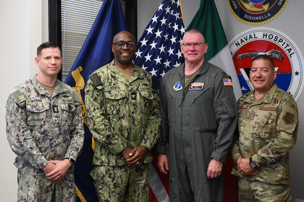 Command Master Chief Jason L. Marnne of Naval Medical Readiness Training Command (NMRTC) Sigonella, and Captain TaRail Vernon, Commanding Officer, NMRTC Sigonella, and Director of US Naval Hospital (USNH) Sigonella met with Colonel Brian Dursteler and Chief Master Sergeant George R. Silvas from the 161st Medical Group, Arizona Air National Guard, July 14–24. Airmen from the ANG, working alongside medical personnel assigned to NMRTC Sigonella, completed Medical Facility Annual Training at U.S. Naval Hospital Sigonella. The training reinforced interoperability and advanced readiness across the Defense Health Network Europe.