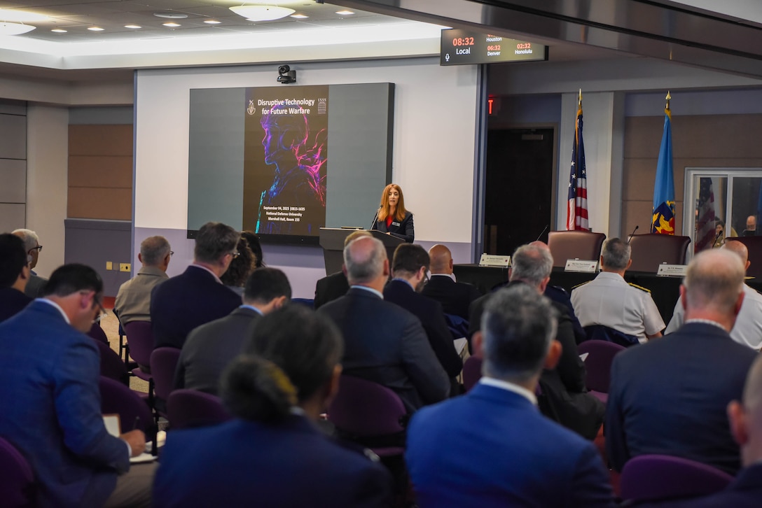 INSS Director speaks at the podium during the INSS Disruptive Technology for Future Warfare Conference at NDU.