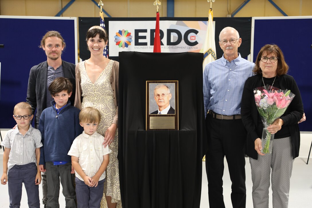 Randy Hill is joined by his family during an induction ceremony at the Cold Regions Research and Engineering Laboratory in Hanover, New Hampshire, to mark his induction into the CRREL Gallery of Distinguished Employees.
