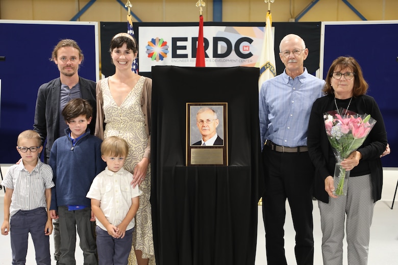 Randy Hill is joined by his family during an induction ceremony at the Cold Regions Research and Engineering Laboratory in Hanover, New Hampshire, to mark his induction into the CRREL Gallery of Distinguished Employees.
