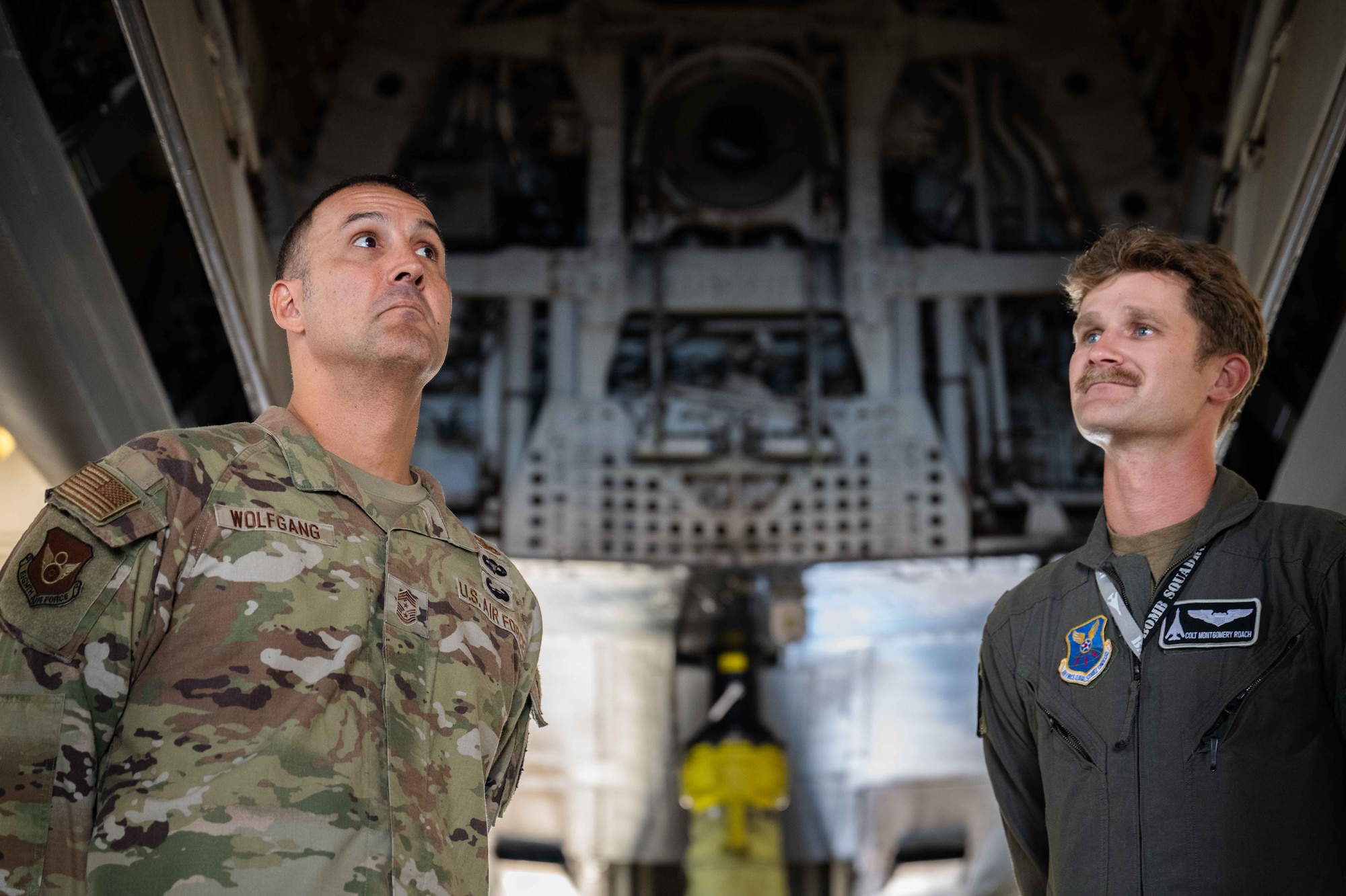 U.S. Air Force Chief Master Sgt. Brandon Wolfgang, Eighth Air Force command chief and Joint-Global Strike Operations Center senior enlisted leader, views a B-1B Lancer munitions bay with 1st Lt. Colton Roach, 9th Bomb Squadron pilot, during a base tour at Dyess Air Force Base, Texas, Sept. 3, 2025.  Wolfgang discussed the operational capabilities of the B-1B and its current and future roles supporting the Air Force Global Strike Command mission. (U.S. Air Force photo by Senior Airman Jade M. Caldwell)