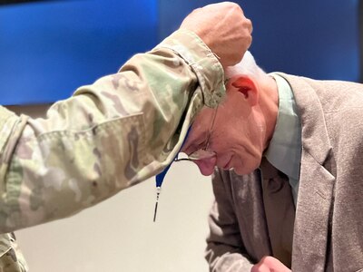 88th Readiness Division command historian receives honorary 'Order of the 88th'