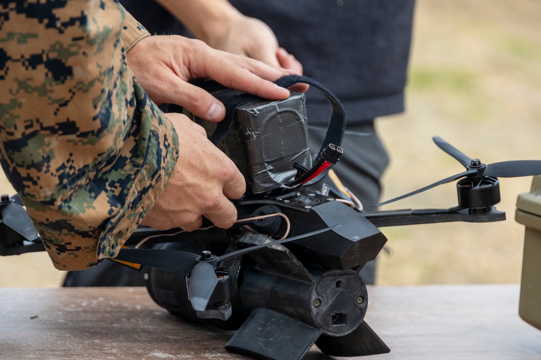 U.S. Marine Corps Cpl. Cooper Ross, a small unmanned aircraft systems operator with 3rd Light Armored Reconnaissance Battalion, 1st Marine Division, assembles a drone during Project G.I. at Marine Corps Base Camp Pendleton, California, Aug. 25, 2025. The Defense Innovation Unit’s Project G.I. Challenge brought together Marines with I Marine Expeditionary Force, industry partners, and Department of Defense leaders to evaluate commercial sUAS, with Marine feedback shaping future procurement decisions and advancing modernization for contested environments. Ross is a native of Colorado. (U.S. Marine Corps photo by Sgt. Adeola Adetimehin)