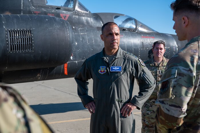U.S. Air Force Gen. Adrian Spain, commander of Air Combat Command (ACC) is briefed by Senior Airman Benas Jonikas, 9th Aircraft Maintenance Squadron U-2 assistant dedicated crew chief, during a visit to Beale Air Base, California, Sept. 5th, 2025. Spain visited various units of the 9th Reconnaissance Wing to deepen his understanding of the critical role the wing plays to advance ACC’s mission by providing high altitude reconnaissance, mission ready airmen, and combat ammunition expertise to combatant commands, while integrating resilient installation services. (U.S. Air Force photo by Airman 1st Class Chelsea Arana)