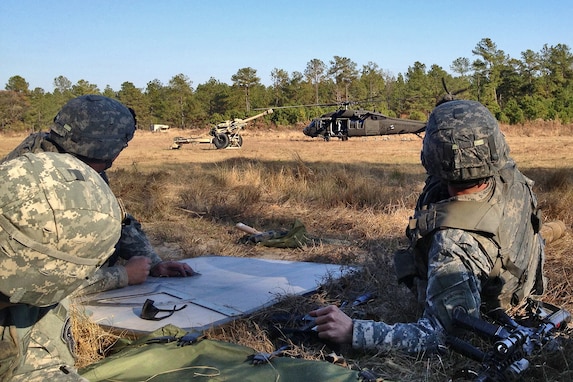 Soldiers from 2nd Platoon, Alpha Battery, 1-319th Airborne Field Artillery Regiment, participates in live air assault operations training at Fort Bragg, North Carolina in 2012.