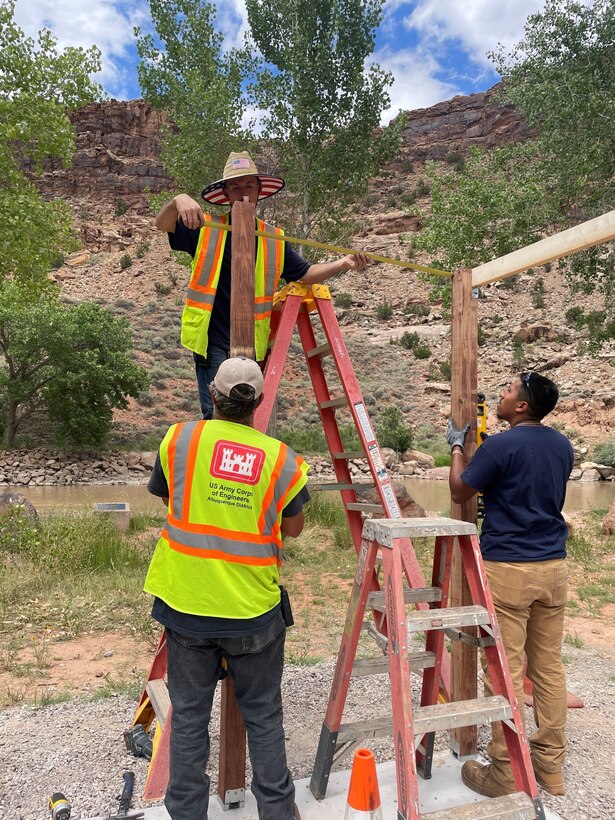 The maintenance crew at Abiquiu Lake practice safe ladder use while building the Wave Changing Station in the Rio Chama Recreation Area, June 26, 2024.