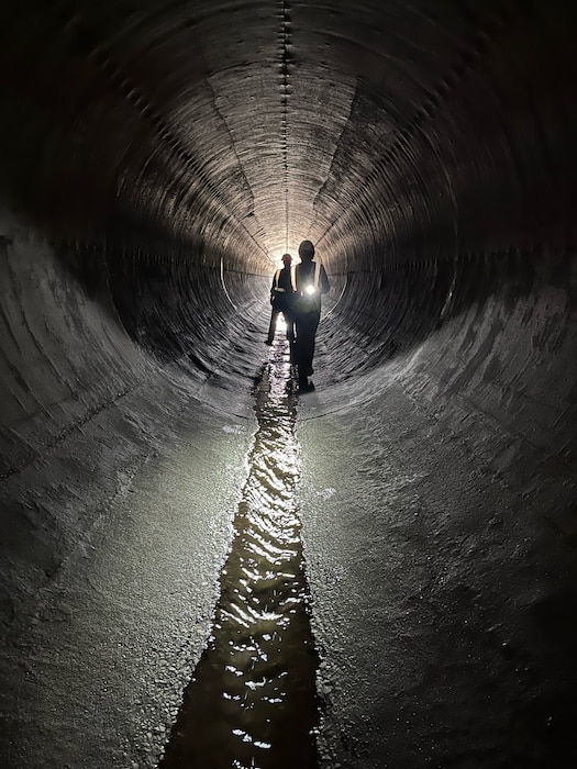 Two Albuquerque District employees conduct the annual inspection on the Galisteo Dam conduit, May 8, 2025. Photo by Prakash Kaini, chief, Water Management Section.