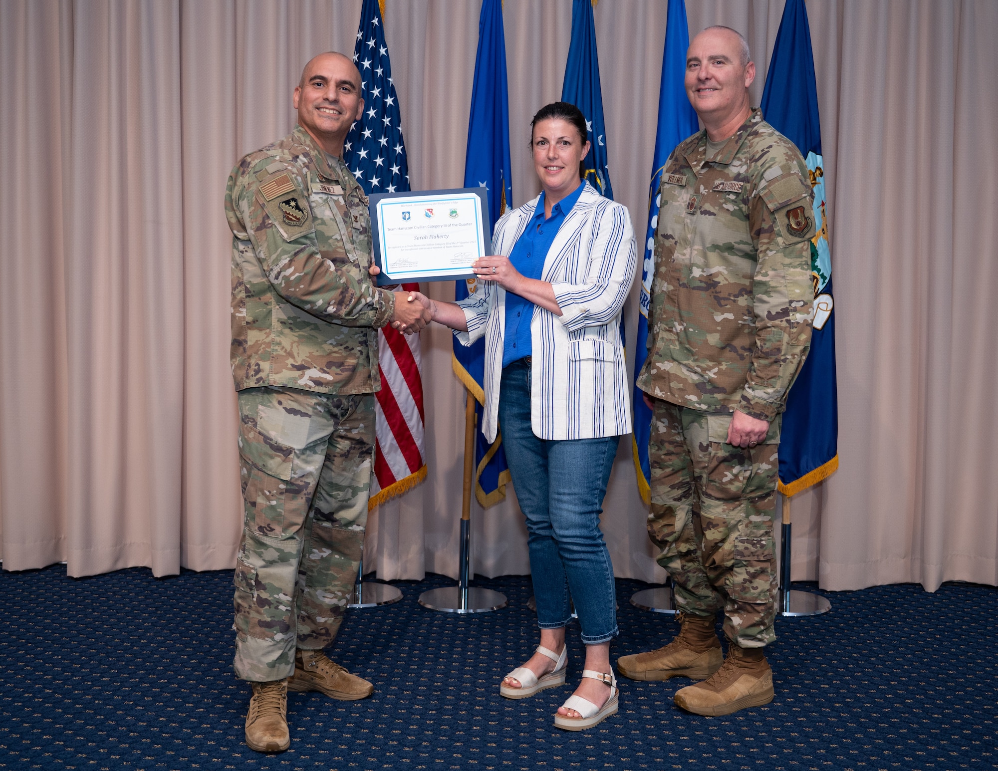 image of a person receiving an award.