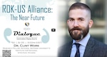 Dr. Clint Work (right) is facing ahead in a suit and tie, with the words "ROK-U.S. Alliance: The Near Future—A Dialogue" with Dr. Clint Work's name and affiliation with the Institute for National Strategic Studies at National Defense University.