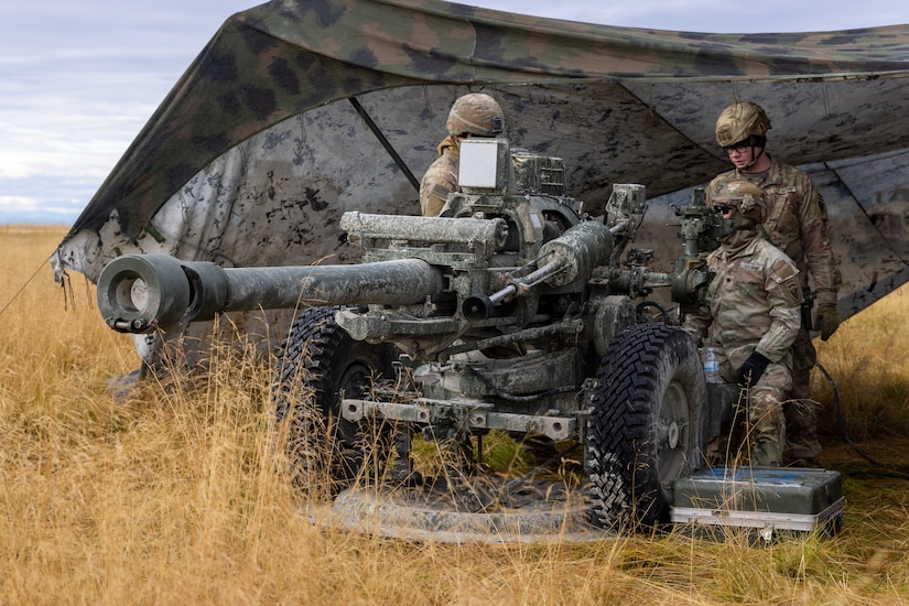 Soldiers assigned to 2nd Battalion, 8th Field Artillery Regiment, 1st Infantry Brigade Combat Team (Arctic), 11th Airborne Division conduct pre-fire checks on a M119 Howitzer at Yukon Training Area, Alaska, Sept. 6 2025 during Exercise Yudh Abhyas 25.