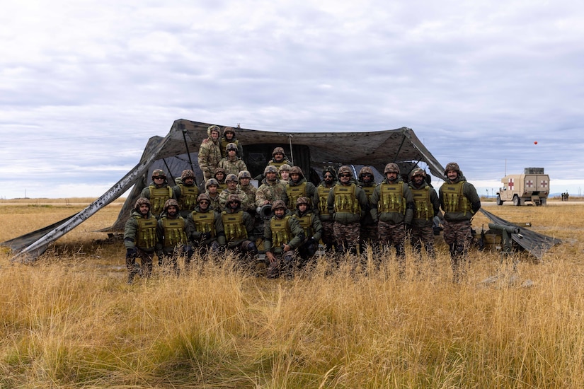 Soldiers assigned to 2nd Battalion, 8th Field Artillery Regiment, 1st Infantry Brigade Combat Team (Arctic), 11th Airborne Division alongside Indian Army soldiers pose for a photo around a M119 Howitzer at Yukon Training Area, Alaska, Sept. 6 2025 during Exercise Yudh Abhyas 25. Yudh Abhyas 25 is a bilateral training exercise between the Indian Army and U.S. Army’s 11th Airborne Division, held in Fairbanks, Alaska, supporting a free and open Indo-Pacific region.