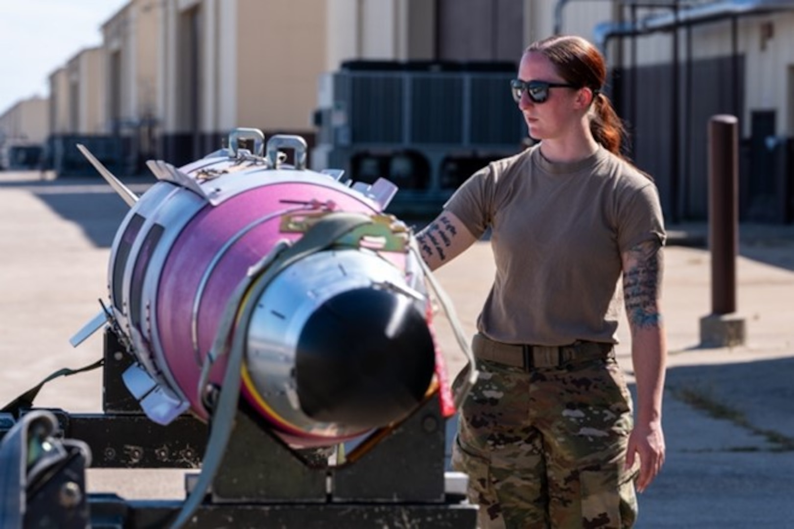 U.S. Air Force Tech. Sgt. Brandi Fern, 72nd Test and Evaluation Squadron maintenance systems evaluator, inspects a GBU-31 Joint Direct Attack Munition prior to it being loaded into a B-2 Spirit aircraft at Whiteman Air Force Base, Missouri, Aug. 28, 2025. JDAMs were used for an Air Force Research Laboratory QUICKSINK Joint Capability Technology Demonstration in the High North, in collaboration with Norwegian Allies, where the precision-guided munitions validated maritime strike capabilities. (U.S. Air Force photo by Staff Sgt. Joshua Hastings)