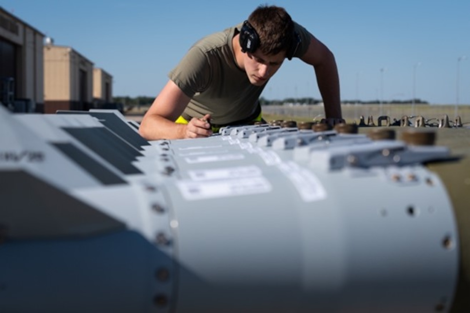 A U.S. Airman assigned to the 393rd Bomber Generation Squadron inspects GBU-38 Joint Direct Attack Munitions prior to them being loaded into a B-2 Spirit aircraft at Whiteman Air Force Base, Missouri, Aug. 28, 2025. JDAMs were used for an Air Force Research Laboratory QUICKSINK Joint Capability Technology Demonstration in the High North, in collaboration with Norwegian Allies, where the precision-guided munitions validated maritime strike capabilities. (U.S. Air Force photo by Staff Sgt. Joshua Hastings)