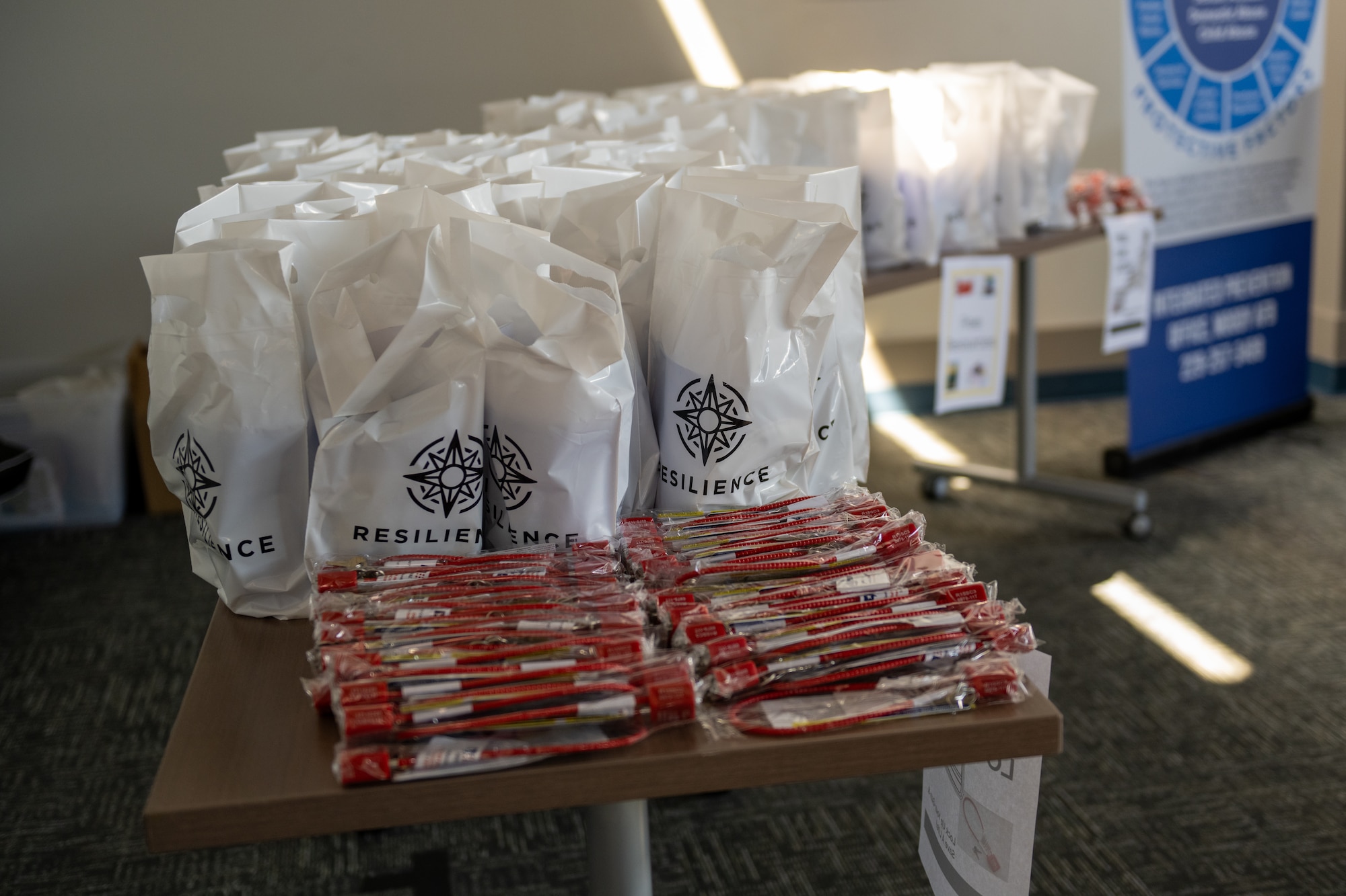 Gift bags displayed on a table.