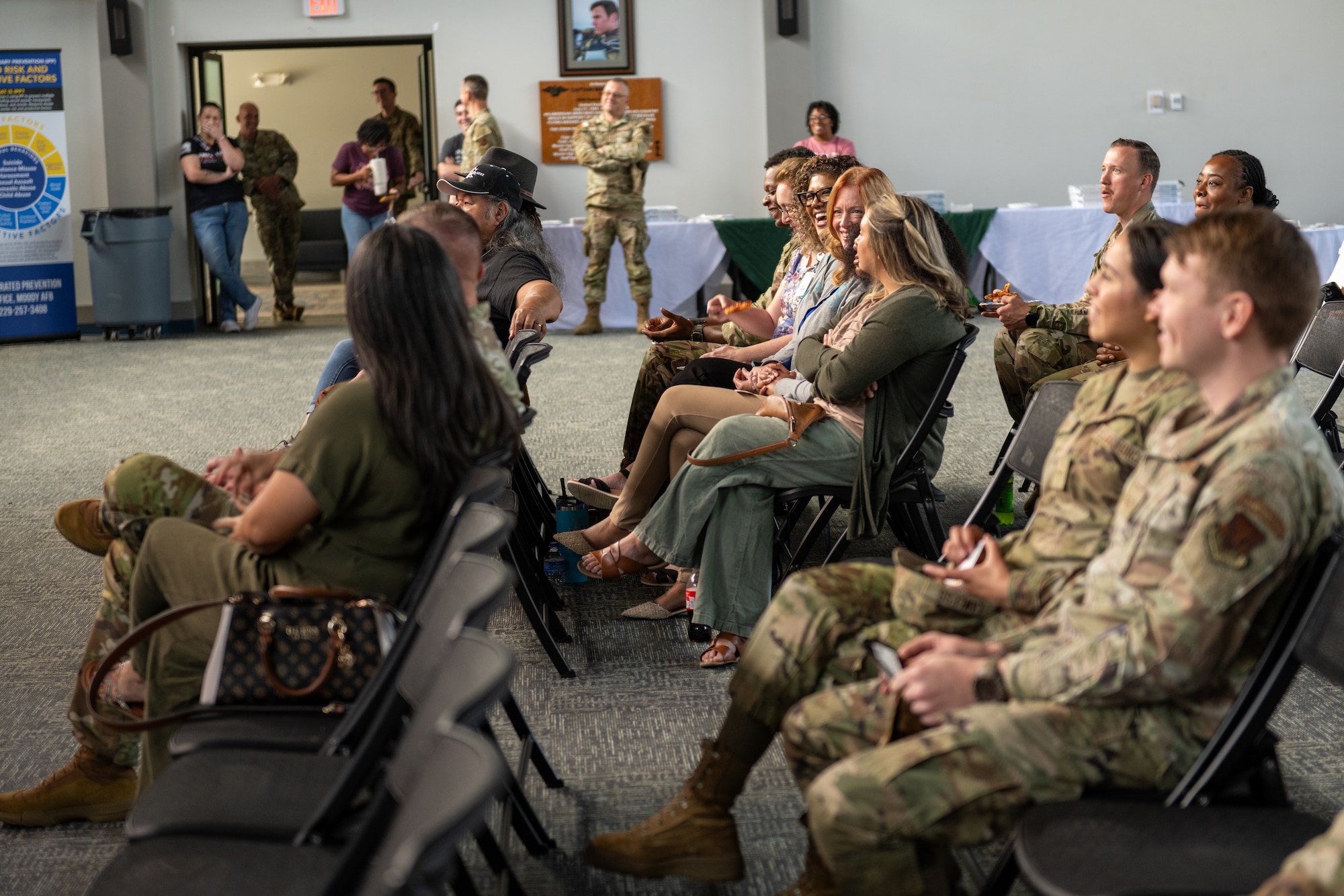 People sitting in an audience.