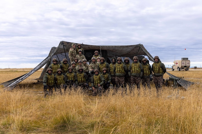 Soldiers assigned to 2nd Battalion, 8th Field Artillery Regiment, 1st Infantry Brigade Combat Team (Arctic), 11th Airborne Division alongside Indian Army soldiers pose for a photo around a M119 Howitzer at Yukon Training Area, Alaska, Sept. 6 2025 during Exercise Yudh Abhyas 25. Yudh Abhyas 25 is a bilateral training exercise between the Indian Army and U.S. Army’s 11th Airborne Division, held in Fairbanks, Alaska, supporting a free and open Indo-Pacific region.