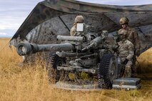 Soldiers assigned to 2nd Battalion, 8th Field Artillery Regiment, 1st Infantry Brigade Combat Team (Arctic), 11th Airborne Division conduct pre-fire checks on a M119 Howitzer at Yukon Training Area, Alaska, Sept. 6 2025 during Exercise Yudh Abhyas 25.
