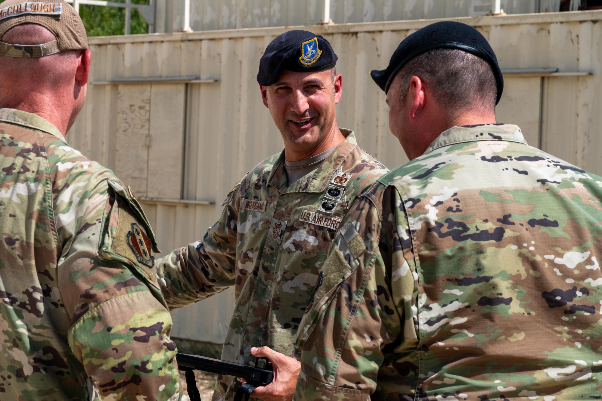 U.S. Air Force Chief Master Sgt. Brandon Wolfgang, Eighth Air Force command chief and Joint-Global Strike Operations Center senior enlisted leader, converses with 7th Bomb Wing Airmen during a base tour at Dyess Air Force Base, Texas, Sept. 2, 2025. Wolfgang is responsible to the 8th AF commander for the combined total force integration, utilization, readiness, assignment, morale and welfare of more than 24,000 joint warfighters. (U.S. Air Force photo by Airman 1st Class Adrien Tran)