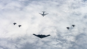 A U.S. Air Force B-2 Spirit, center, from the 72d Test and Evaluation Squadron assigned to the 53rd Wing, a Royal Norwegian Air Force P-8 Poseidon, center back, and four Royal Norwegian Air Force F-35 Lightning II, right and left, fly in formation over Norway, Sept. 3, 2025. The U.S. partnered with Norwegian Allies to test next-generation precision maritime strike capabilities. The event advanced tactics, techniques, and procedures for long-range sensor-to-shooter operations. (U.S. Air Force Photo by Tech. Sgt. Jesenia Landaverde)