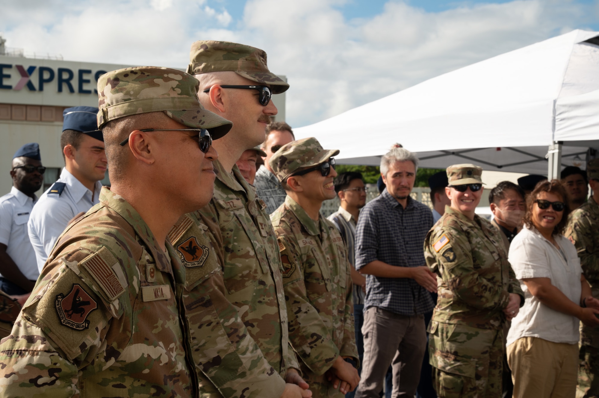 U.S. Air Force Col. Mata and Col. Frantz listen to a speech during an award ceremony.