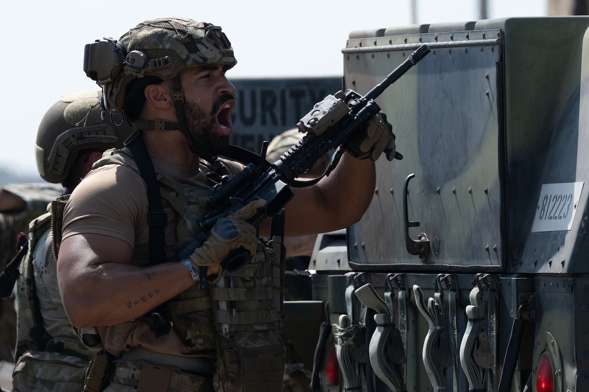 A 39th Security Forces Squadron Airman simulates engaging with adversaries during Exercise Titan Shield 25-09 at Incirlik Air Base, Türkiye, Sept. 9, 2025. The exercise trains and tests the 39th Air Base Wing’s ability to maintain operational effectiveness and respond to contingencies in contested environments. (U.S. Air Force photo by Senior Airman Greydon Furstenau)