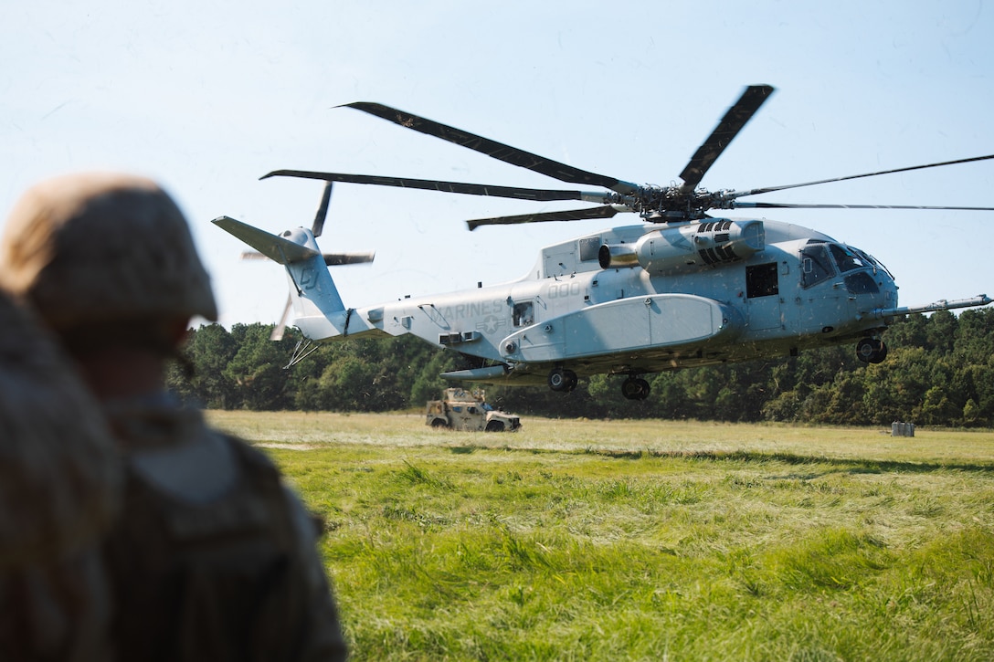 A U.S. Marine Corps CH-53K King Stallion helicopter assigned to Marine Heavy Helicopter Squadron (HMH) 461, Marine Aircraft Group 29 prepares to land during a helicopter support team exercise at Marine Corps Base Camp Lejeune, North Carolina, Sep. 4, 2025. Combat Logistics Battalion 22 and HMH-461 conducted helicopter support team operations to enhance each unit’s ability to coordinate the safe rigging, loading, and lifting of vehicles by helicopter for precise and secure air transport. (U.S. Marine Corps photo by Sgt. Jorge Borjas)