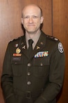 U.S. Army Lt. Col. Michael Orestes, director for Education, Training, and Research (DETR), poses for a photo at a research program award ceremony at Walter Reed, May 22, 2025. The annual event brings together top researchers across the Department of Defense to showcase advances in health care and military science.