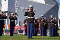 U.S. Marine Corps Staff Sgt. Meggan Peel, a flute instrumentalist with the 2nd Marine Aircraft Wing Band, assigned to Special Purpose Marine Air-Ground Task Force-250 performs at the static display during Marine Week Atlanta, Aug. 30, 2025. Marines stationed across the globe commemorate the 250th anniversary of the Marine Corps, honoring a distinguished legacy of service, sacrifice, and unwavering fidelity to both the nation and the Corps. (U.S. Marine Corps photo by Staff Sgt. Matthew Booth)