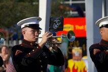 U.S. Marine Corps Lance Cpl. Nathaniel Privett, a trumpet instrumentalist with the 2nd Marine Aircraft Wing Band, assigned to Special Purpose Marine Air-Ground Task Force-250 performs at the static display during Marine Week Atlanta, Aug. 30, 2025. Marines stationed across the globe commemorate the 250th anniversary of the Marine Corps, honoring a distinguished legacy of service, sacrifice, and unwavering fidelity to both the nation and the Corps. (U.S. Marine Corps photo by Gunnery Sgt. Micheal Newell)