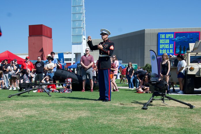 U.S. Marine Corps Sgt. Taylor Brown, conducts the 2nd Marine Aircraft Wing Band, assigned to Special Purpose Marine Air-Ground Task Force-250 at the static display during Marine Week Atlanta, Aug. 31, 2025. Marines stationed across the globe commemorate the 250th anniversary of the Marine Corps, honoring a distinguished legacy of service, sacrifice, and unwavering fidelity to both the nation and the Corps. (U.S. Marine Corps photo by Cpl. Tannah Morris)
