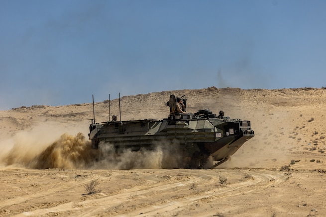 U.S. Marines assigned to 4th Assault Amphibian Battalion maneuver an Assault Amphibious Vehicle (AAV) during a live fire training exercise for BRIGHT STAR 25 at Mohamed Naguib Military Base (MNMB), Egypt, Sep. 2, 2025. BRIGHT STAR 25 showcases our unified resolve and ability to respond to evolving challenges together. Strong defense partnerships like BRIGHT STAR build lasting capacity, improve interoperability, and send a clear message of deterrence to those who threaten (our partners) and regional peace and stability. (U.S. Army Photo by Joseph Kumzak)