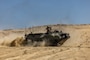 U.S. Marines assigned to 4th Assault Amphibian Battalion maneuver an Assault Amphibious Vehicle (AAV) during a live fire training exercise for BRIGHT STAR 25 at Mohamed Naguib Military Base (MNMB), Egypt, Sep. 2, 2025. BRIGHT STAR 25 showcases our unified resolve and ability to respond to evolving challenges together. Strong defense partnerships like BRIGHT STAR build lasting capacity, improve interoperability, and send a clear message of deterrence to those who threaten (our partners) and regional peace and stability. (U.S. Army Photo by Joseph Kumzak)