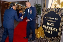 U.S. Air Force Col. James M. Clark, commander of Joint Base Anacostia-Bolling and the 11th Wing, right, shakes hands with an attendee of the JBAB U.S. Air Force 78th Birthday Ball, Washington, D.C., Sept. 5, 2025. The U.S. Air Force Honor Guard delivered premier ceremonial honors and The United States Air Force Band’s Strolling Strings honored Air Force heritage in support of the event. (U.S. Air Force photo by Hayden Hallman)