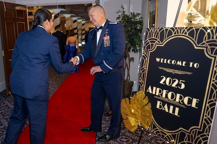 U.S. Air Force Col. James M. Clark, commander of Joint Base Anacostia-Bolling and the 11th Wing, right, shakes hands with an attendee of the JBAB U.S. Air Force 78th Birthday Ball, Washington, D.C., Sept. 5, 2025. The U.S. Air Force Honor Guard delivered premier ceremonial honors and The United States Air Force Band’s Strolling Strings honored Air Force heritage in support of the event. (U.S. Air Force photo by Hayden Hallman)