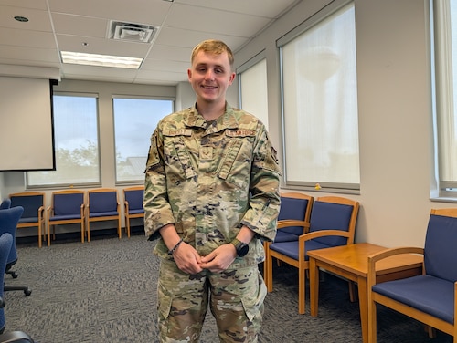 Senior Airman Bradley poses for a photo at the Security Forces Headquarters.