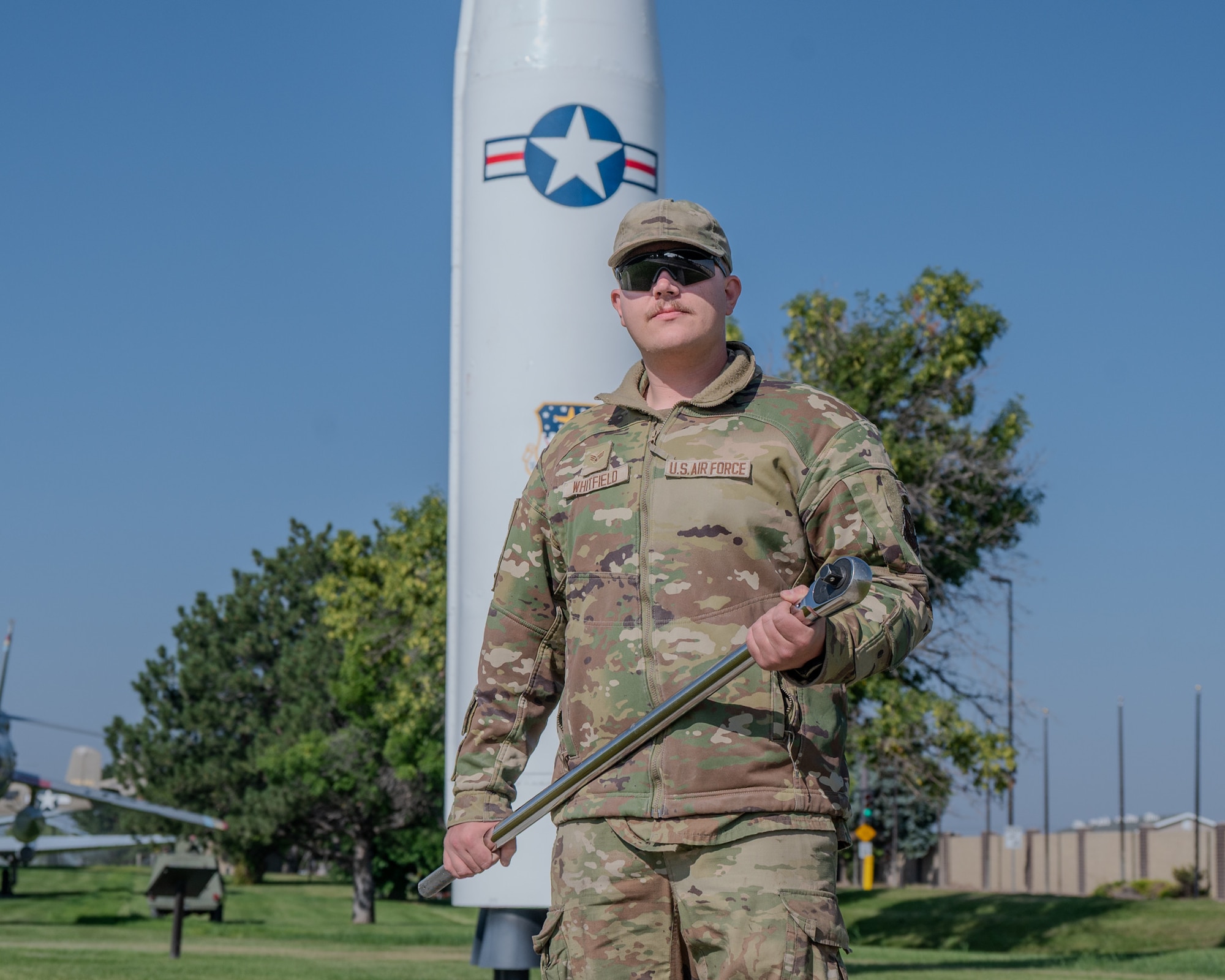 Airman holds wrench