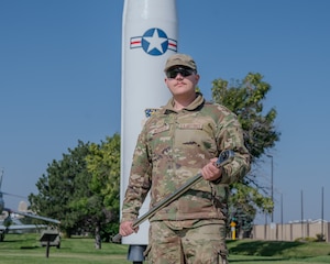 Airman holds wrench