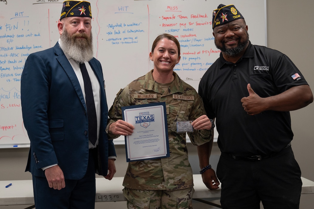 Staff Sgt. Lindsey Neubauer, 433rd Aeromedical Staging Squadron, was presented the Spirit of Service Award by the American Legion, during the 433rd Medical Group’s commander’s call, Aug. 2, 2025.