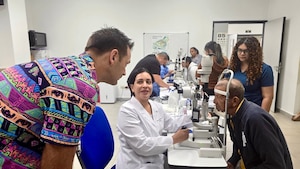 Dr. Ivonne Alvarado, Ophthalmologist at Dr. Luis “Chicho” Fabrega Regional Hospital evaluates a patient ahead of the eight-day eye surgical mission during Panamax Alpha Phase II, Santiago de Veraguas, Panama, Aug. 26, 2025, through Sept. 11, 2025. The surgical mission brought together 48 local and U.S. doctors, nurses, and technicians to complete cataract removals, corneal transplants and other complex procedures alleviating an over six-month wait for some. The over 200 surgeries provided not only improved eyesight but symbolized the strength of the U.S.-Panama partnership. (Courtesy Photo)