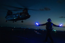 A CH-47F Chinook helicopter assigned to the U.S. Army 25th Combat Aviation Brigade takes off from the flight deck of the amphibious assault ship USS America (LHA 6) while conducting flight operations in the Pacific Ocean, Sept. 7.